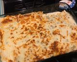 A picture of step 11 of Creamy White Chicken Enchiladas.