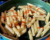 A picture of step 4 of Cheesy Pasta Sticks.