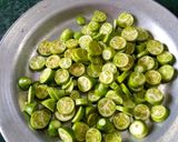 A picture of step 1 of Ivy Gourd Masala Fry.