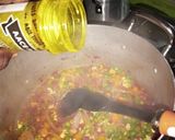 A picture of step 3 of Chinese fried rice with coleslow and fry meat.
