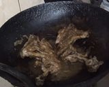 A picture of step 2 of Green chicken tikka.