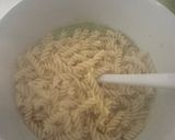 A picture of step 4 of Pasta with Zucchini Pesto.