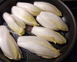 Une image de l'étape 2 de °Endives braisées à la crème et au curry°.