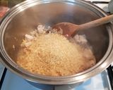 A picture of step 3 of Rice and Chicken soup.