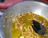 A picture of step 2 of Aaloo ka bhurta (Mash potatoes).