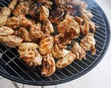 A picture of step 4 of Grilled Chicken Ribs on the Charcoal Grill 🍗.