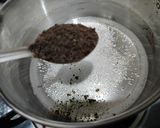 A picture of step 1 of Cardamom tea (Elaichi chai).