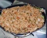 A picture of step 5 of Schezwan fried rice sizzler.