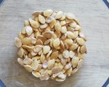 Une image de l'étape 3 de Graines de potimarron façon pop corn.