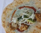 A picture of step 10 of Tikka roll paratha.