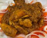 A picture of step 10 of Chicken Tandoori Masala with Paratha.