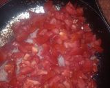 A picture of step 5 of Eggs with Tomato and Onion.