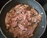 A picture of step 2 of Beef double cheese burger.