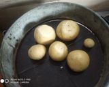 राजस्थानी स्टफ दाल -बाटी(बिना ओवन और बाटी कूकर के)साथ लहसुन चटनी रेसिपी चरण 10 फोटो
