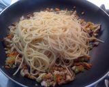 A picture of step 6 of Spaghetti with Rabbit Ragù, Mushrooms, and Walnuts.
