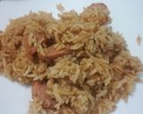 A picture of step 7 of Sausage pilau.