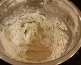 A picture of step 18 of Carrot Cake Roll with Whipped Cinnamon Cream Cheese Filling and Frosting.