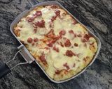A picture of step 6 of Mozeralla and sausage Pizza.