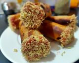 A picture of step 9 of Rotli cigars using leftover farsan after Diwali.