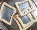 A picture of step 2 of Cheesy Egg Toast.