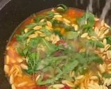 Foto del passaggio 7 della ricetta Cavatelli e rucola al pomodoro