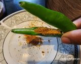 A picture of step 1 of ہری مرچ کے بھرواں پکوڑے.