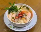 Hình bước làm 3 của món Canh lườn cá hồi nấu măng chua