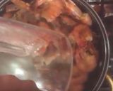 A picture of step 8 of Camarones a la Diabla.