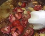 A picture of step 7 of Alu matar gravy.
