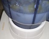 A picture of step 2 of Banana nuts shake.