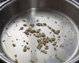 Foto del paso 3 de la receta: Potaje de garbanzos, espinacas y bacalao con toque picante