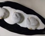 A picture of step 6 of Dahi vada in Appe pan.
