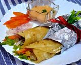 A picture of step 9 of Chicken tikka paratha roll.