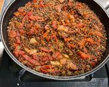 Une image de l'étape 10 de Lentilles brunes aux poivrons rouges et lard fumé.