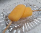 A picture of step 3 of Orange Ice lolly.
