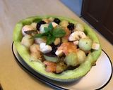 Une image de l'étape 12 de Salade de fruits (melon vert,prunes d ante,mûres,ananas et banane).