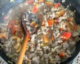 A picture of step 11 of Ground Beef Burrito with Black Beans.