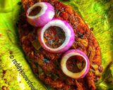A picture of step 12 of Meen Pollichathu- Kerala style fried fish steamed in banana leaf.