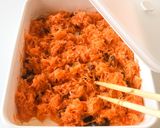 A picture of step 4 of Carrot Rape with Raisins.