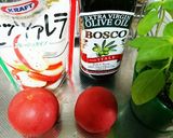 A picture of step 1 of Caprese Salad with Mozzarella Cheese and Tomato.
