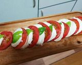 A picture of step 6 of Caprese Salad with Mozzarella Cheese and Tomato.