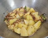 A picture of step 4 of Sem Aloo with Kalonji Seeds.