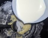 A picture of step 8 of Vanilla cream filled doughnuts.