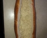A picture of step 4 of Chicken Alfredo in a garlic parm & herb bread bowl.