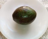 A picture of step 1 of An Avocado and Almond thick shake.