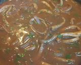 A picture of step 6 of Calamari stewed in Tomatoes.
