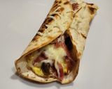 Foto del paso 6 de la receta Fajita de tortilla con champiñones y jamón 😋