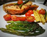 A picture of step 4 of Smoked salmon with roasted asparagus,babycorns and tomatoes.