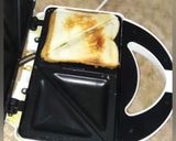 A picture of step 16 of Schezwan mayo sendwitch.