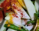 A picture of step 1 of Raw mango,drumstick,coconut curry..mom’s recipe.